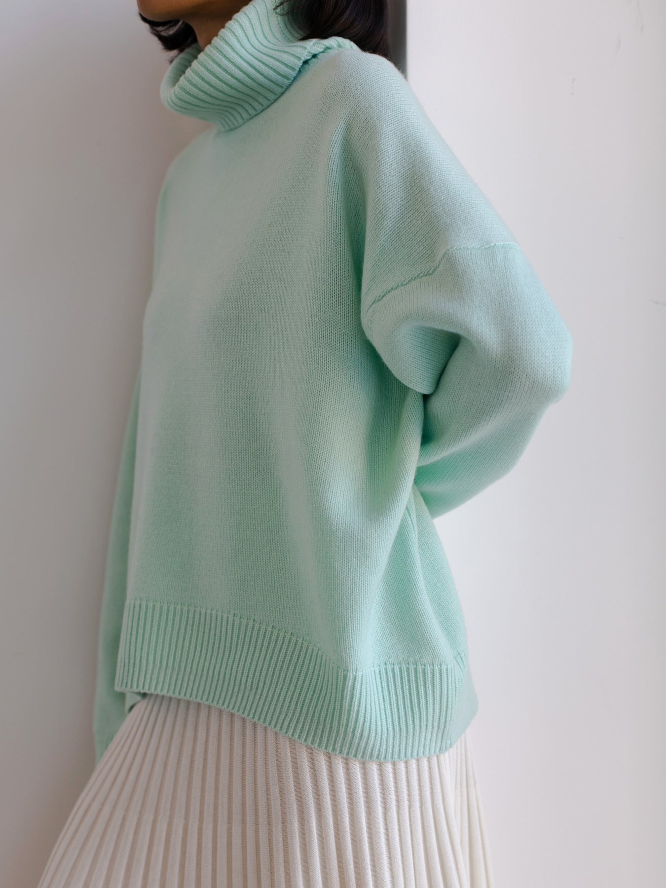 Cema – Jersey oversize con cuello alto