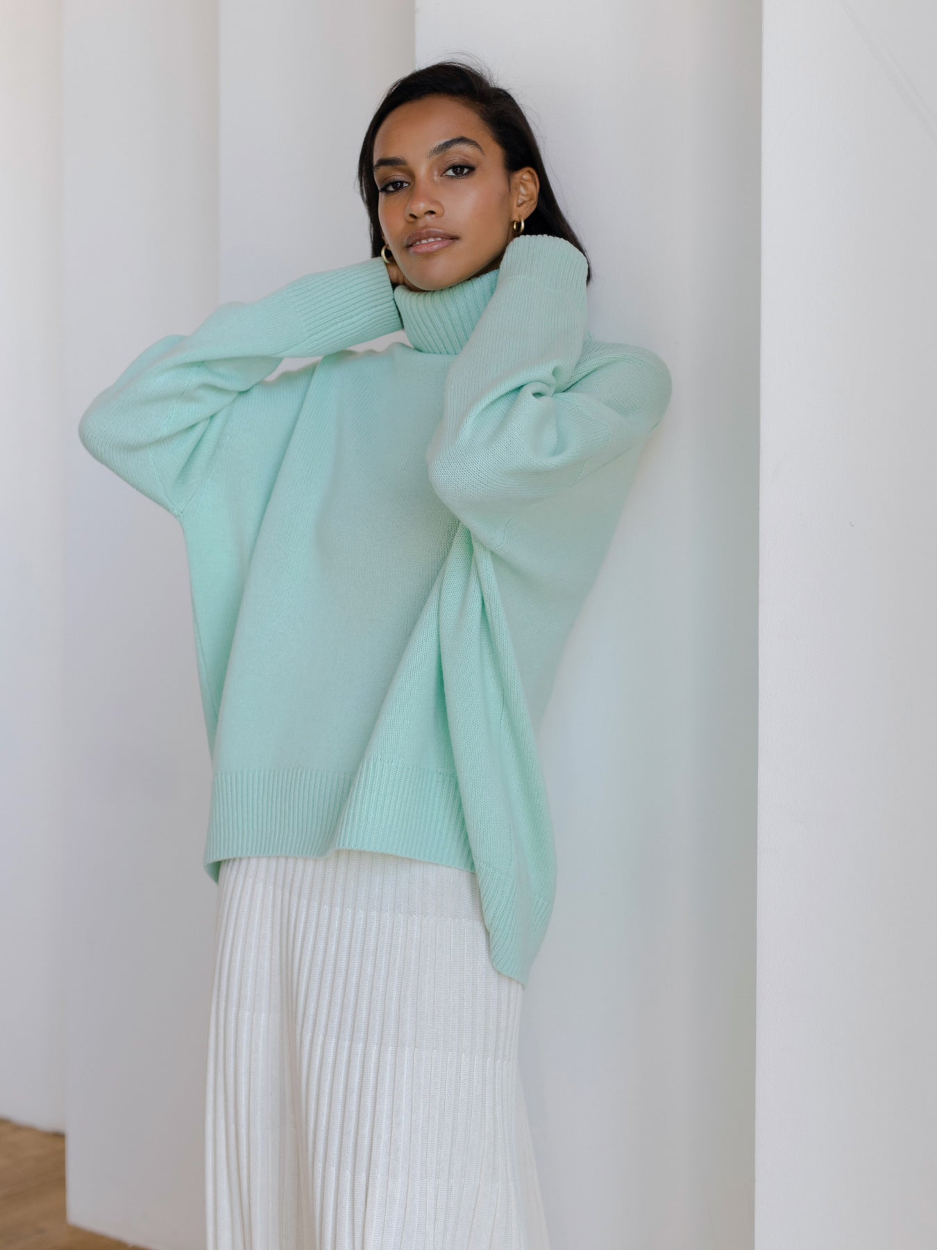 Cema – Jersey oversize con cuello alto