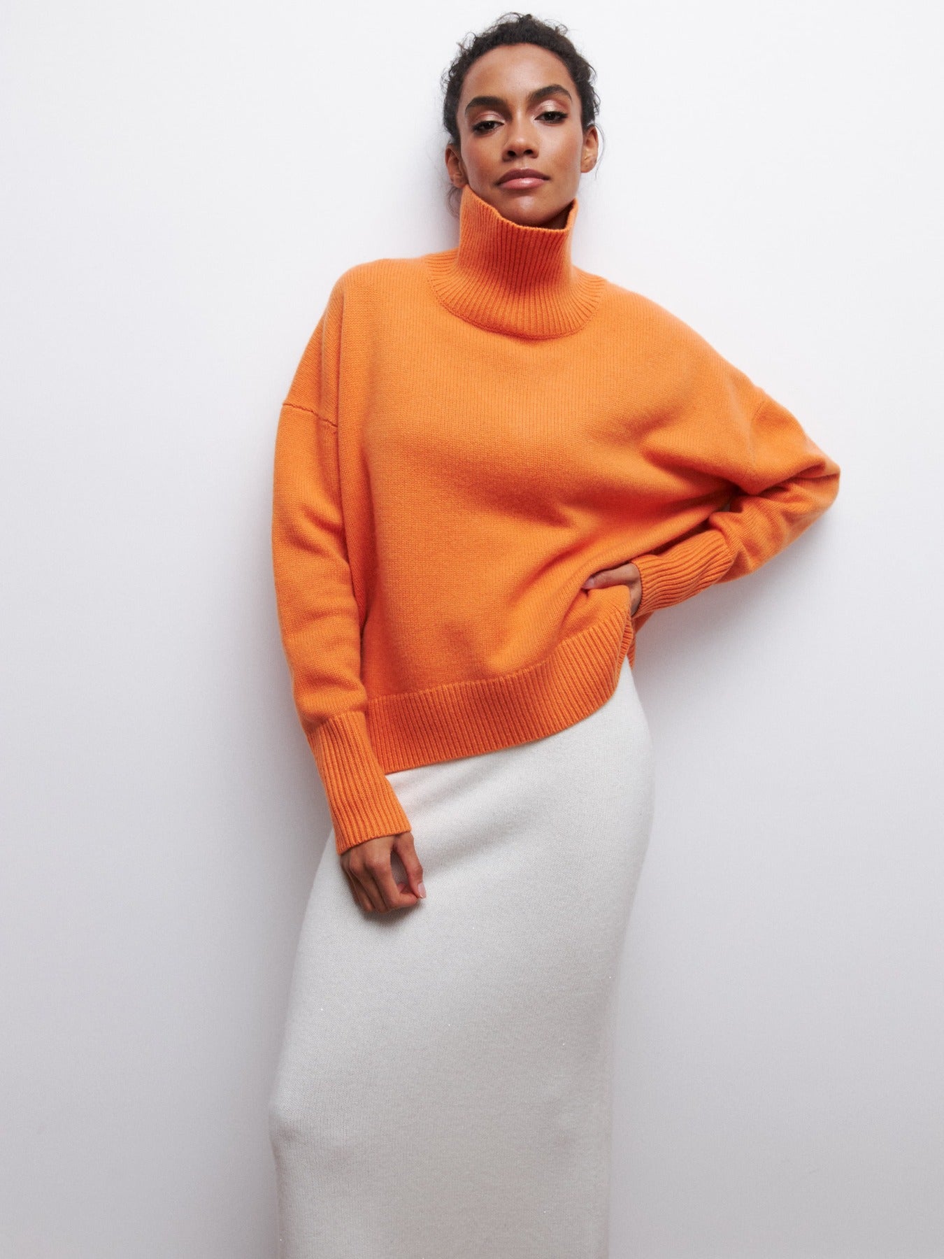 Cema – Jersey oversize con cuello alto