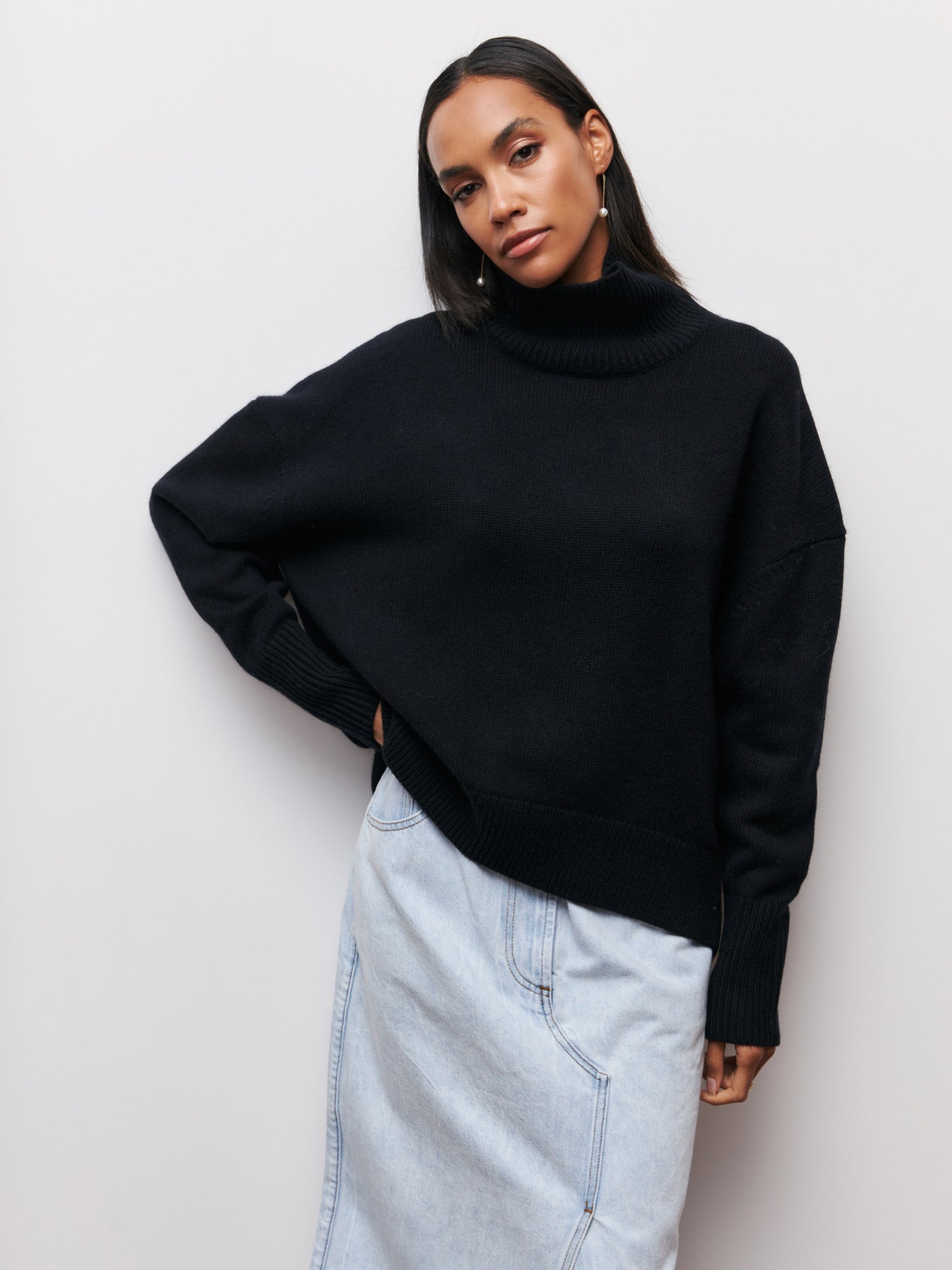 Cema – Jersey oversize con cuello alto