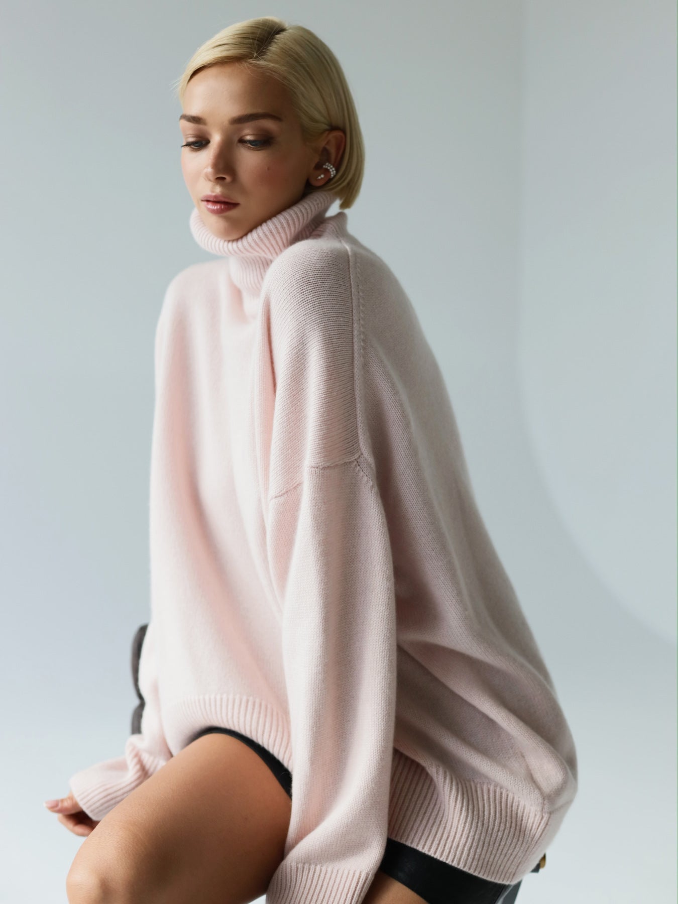 Cema – Jersey oversize con cuello alto