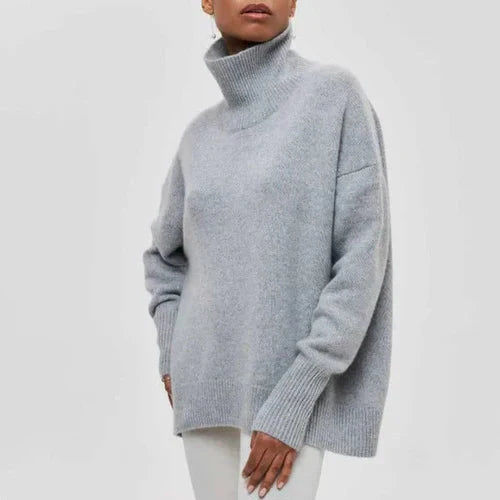 Cema – Jersey oversize con cuello alto