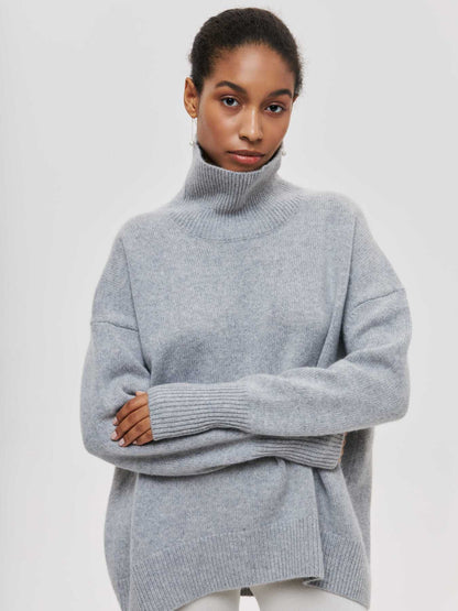 Cema – Jersey oversize con cuello alto